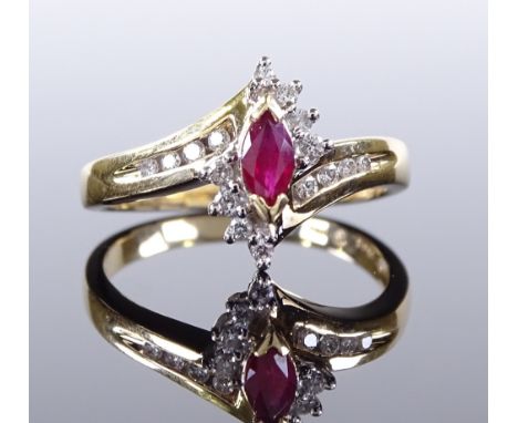 A 14ct gold marquise ruby and diamond cluster ring, setting height 11.9mm, size M, 3.3g 