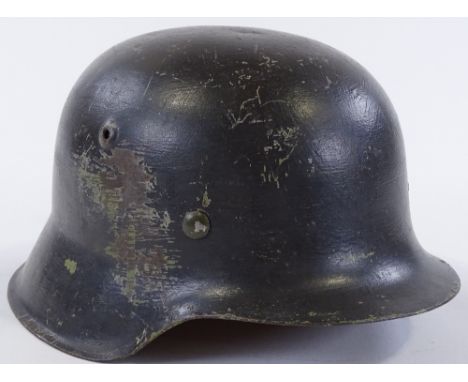 A Second War Period Army tin helmet 