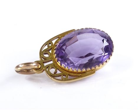 An oval-cut amethyst pendant, in 9ct gold frame, maker's marks AS, height 28.1mm, 6.4g 