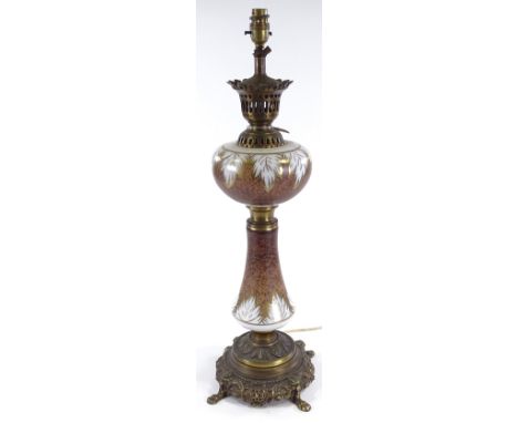 A gilded milk glass table lamp on cast brass base, height excluding fitting 58cm 