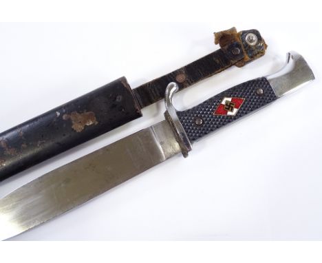 A German Second War Period HJ knife, blade stamped RZM, original metal scabbard 