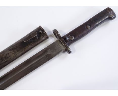 A 19th / 20th century Continental bayonet with scabbard 