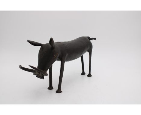 A NAIVE BRONZE SCULPTURE OF WILD BOAR, 19cm high x 39cm long 