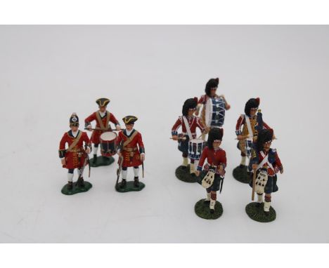 DRUM AND COLOUR GROUP OF FIVE SCOTS GUARDS FIGURES FROM THE WATERLOO ERA, with three soldiers from the Marlborough era, hand 