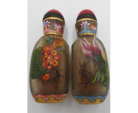 PAIR OF CHINESE FAMILLE ROSE ENAMEL DECORATED GLASS SNUFF BOTTLES 20TH CENTURY painted with fruit and insects, apocryphal Qia