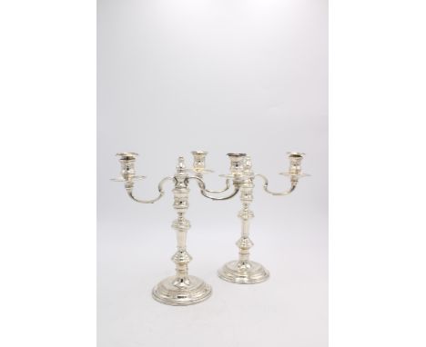 A PAIR OF HALLMARK SILVER THREE BRANCH CANDELABRA, London 1972, 27cm high, 48.5oz total weight inc. weighted bases 