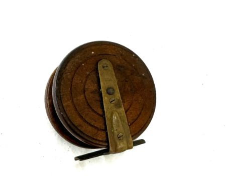 Vintage wooden and brass makers 'Kilwards' reel, approximate diameter 4 inches