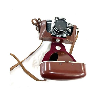 Vintage Cased Exakta camera together with a Carl Zeiss Jena 2.8/50 lens, untested