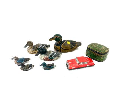 Selection of vintage collectable items to include a red tin toy car, selection of wooden ducks, etc