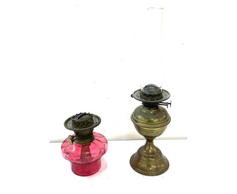 Brass oil lamp, cranberry glass burner