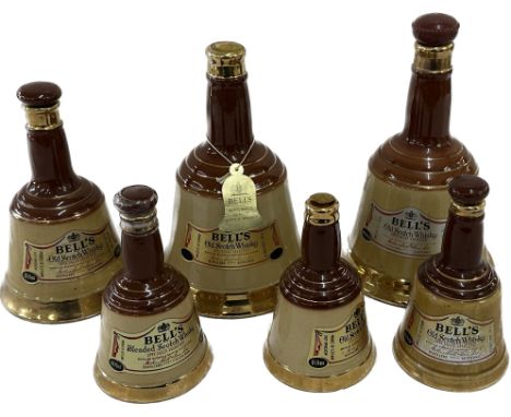 Selection of six Wade bells whisky decanters - empty 