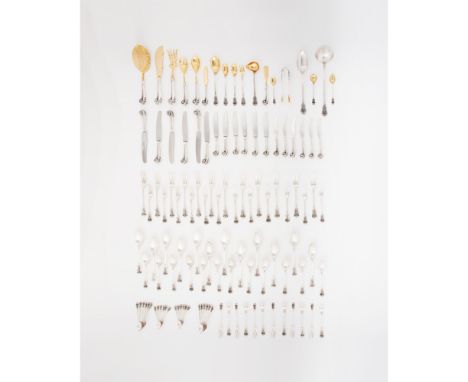 A set of cutlery for 12 coversSilver and gilt-silver 833/000Reliefs decoration and pistol-handled knivesComprising of 18 serv