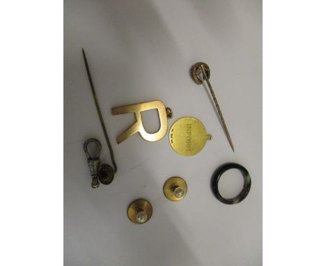 Two pendants, one 18ct, disk inscribed inform, 5.02 gms, the letter R in 9ct gold, 5.67 gms and miscellaneous tie pins etc 