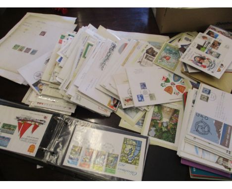British First Day covers along with Victorian and later postage stamps and various Channel Island postcards and stamps 