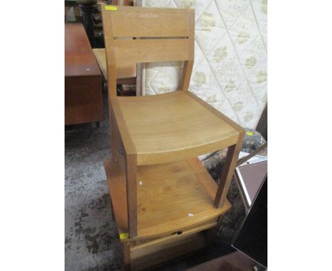 A modern light oak single drawer inset side table, together with a single dining chair 