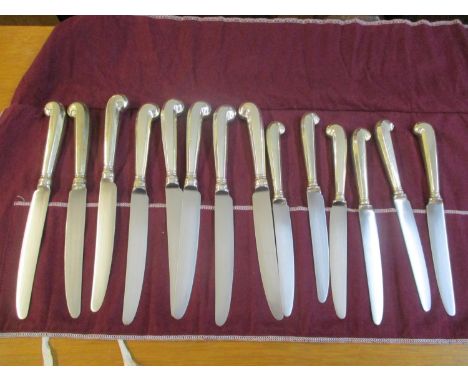 Eight large pistol grip silver handled knives, together with six small pistol grip silver handled knives