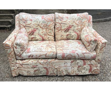 Two seater sofa with loose covers (H84cm W163cm D88cm)Condition Report no rips, fading throughout and stains&nbsp;