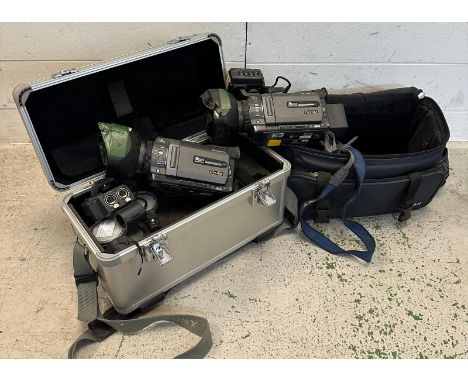 Two cased Sony 3cod Ducan video camera and a Senhieser stick microphone 