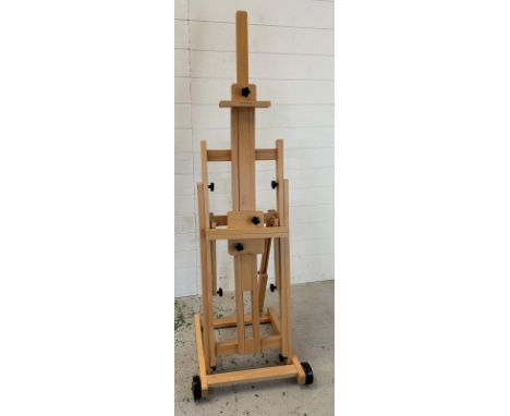 A folding artist easel on wheels by Meeden (H160cm)