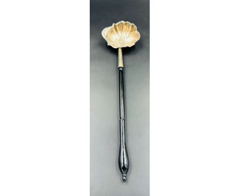 A Georgian silver toddy ladle on ebonised handle, hallmarked for London.