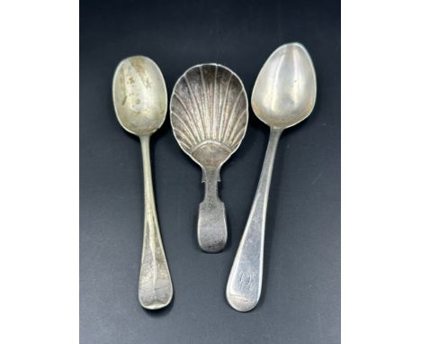 Two silver spoons and a caddy spoon, various makers and hallmarks, approximate weight 45g