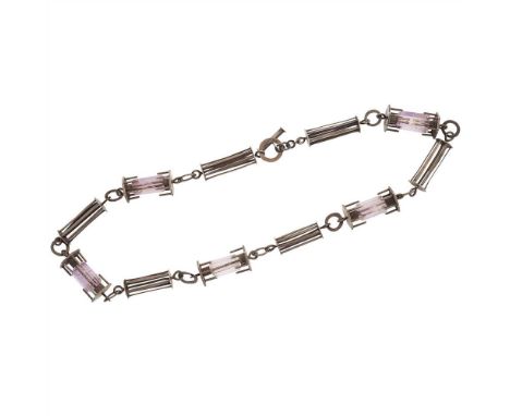 Amethyst and oxidised silver, hallmarked for London 1997, composed of cage-like links set at intervals with polished amethyst