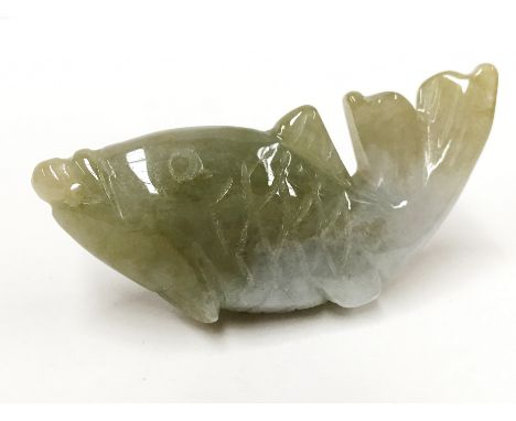 A Chinese grade A apple green jadeite jade fish motif pendant. 21,34 grams, 51.2 x 21.8 x 12.3 mm with certificate of authent