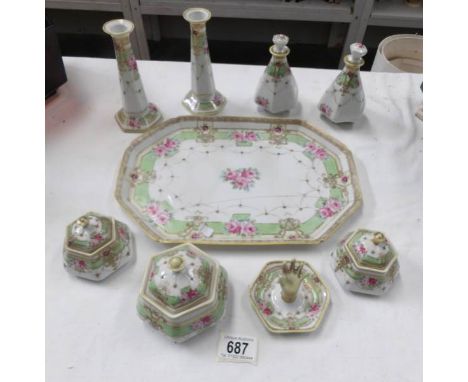 A 9 piece china trinket set, tray a/f