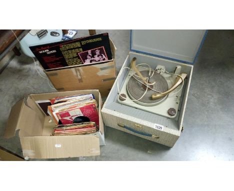 A vintage Argosy record player & collection of LP & single records