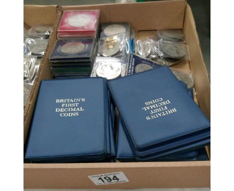 20 folders first decimal coins ets, 20 boxed crowns (mixed), 20 mixed crowns