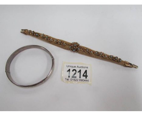 A silver bangle and a turquoise set dress bracelet