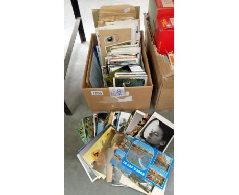 A large quantity of postcards, first day covers etc