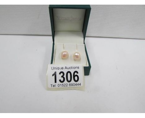 A pair of silver set cultured pearl earrings