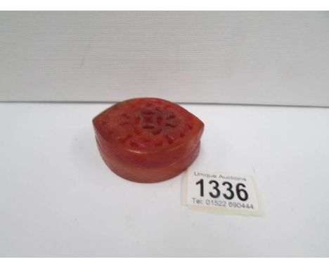 A red jade trinket pot