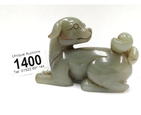 A Chinese 18th/19th century jade figure of a dog