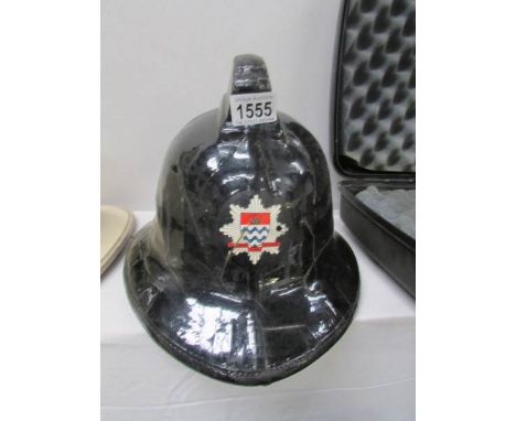 A London fire brigade fireman's helmet