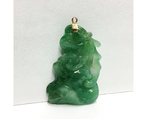 A Chinese 19th century jadeite jade gemstone pendant with ladybird feature, grade A apple green with emerald green inclusions