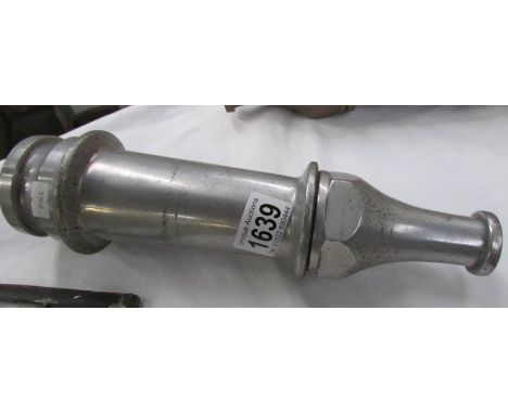 A vintage fire hose end nozzle