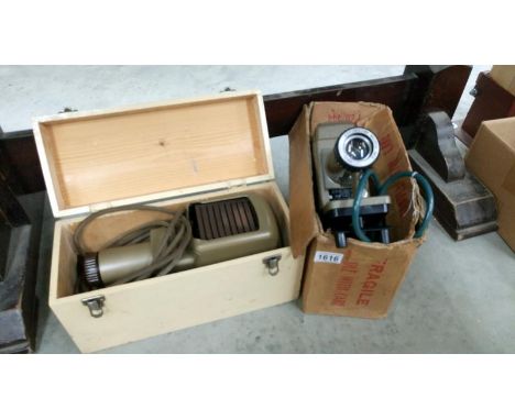 A boxed 'Kodaslide' slide projector and one other