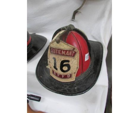An 'SFFD' San Francisco fire department Lieutenant No.16 leather fireman's helmet made by Cairns & Brothers, Clifton, New Jer