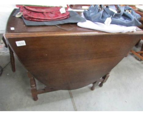 An oak gate leg table