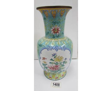A Chinese enamel vase, Late Qing, in excellent condition and stands approximately 30cm tall