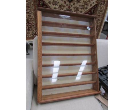 An 8 shelf wall display cabinet