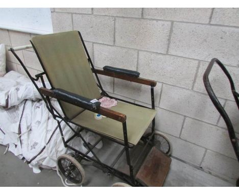 A vintage Alwin wheel chair