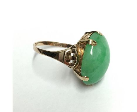 A Chinese grade A apple green jadeite jade stone mounted in a ring, cabouchon cut, 17.8 grams, 19.7 x 14.7 x 7.7mm with certi