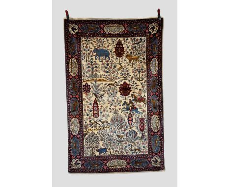 Good Lahore hunting rug, north east Pakistan, circa 1950s-60s,  7ft. 2in. X 4ft. 8in. 2.18m. X 1.42m. The ivory field featuri