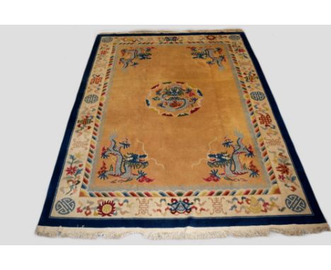 Chinese carpet, Peking, north China, second half 20th century,  11ft. 4in. X 8ft. 4in., 3.45m. X 2.54m. Pale sand field with 