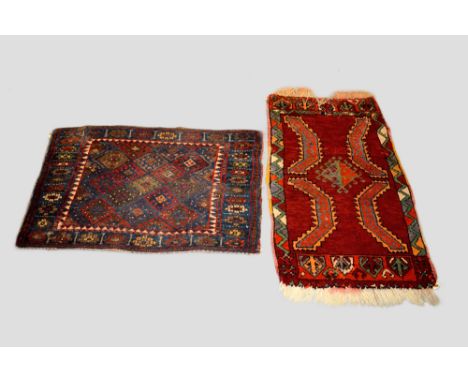 Two pieces: the first a Jaf Kurd khorjin face, north west Persia, early 20th century, 2ft. 2in. X 3ft. 0.66m. X 0.91m. Brocad
