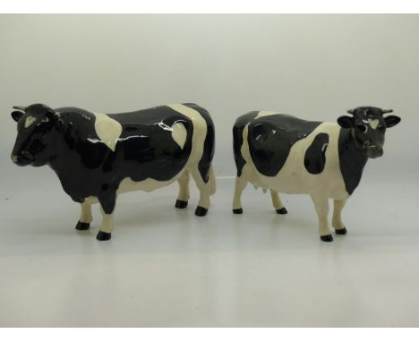 Beswick Friesian bull and cow, largest L: 19 cm, no chips or cracks. UK P&amp;P Group 2 (£20+VAT for the first lot and £4+VAT