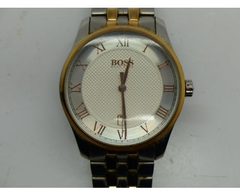 Boss by Hugo Boss gents wristwatch with date aperture on a stainless steel bracelet, boxed, not working at lotting. UK P&amp;